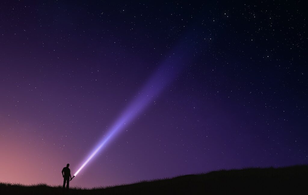 man, flashlight, night sky-5976712.jpg